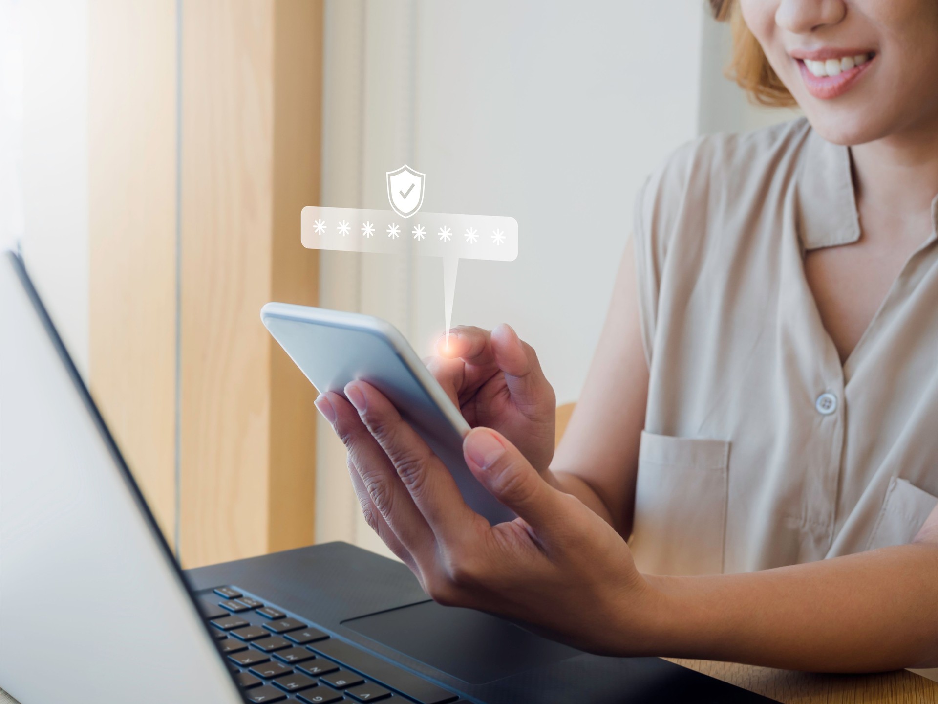 Two steps authentication concept. Virtual safety shield icon while access on phone with laptop for validate password, Identity verification, cybersecurity with biometrics authentication technology.
